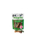 Bolsa de snacks dentales Woolfies Dental Brush para perros mostrando premios con forma de cepillo en colores verde, marrón y naranja