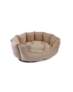 Cuna Luxe de Nayeco en color visón (beige), de forma octogonal y material afelpado, con cojines acolchados y base antideslizante.