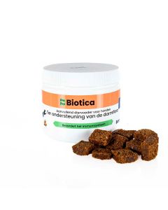 Bote de suplemento Euro Joe Pre y Probiótica junto a snacks masticables para la digestión del perro